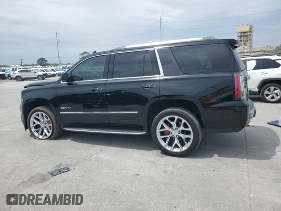 2017 GMC Yukon Denali with VIN 1GKS1CKJ9HR211240, listed as a Copart auction lot 50973015 with 95,484 mi miles and Salvage Title. Bid and sale history available at carsss.com. Image 2.