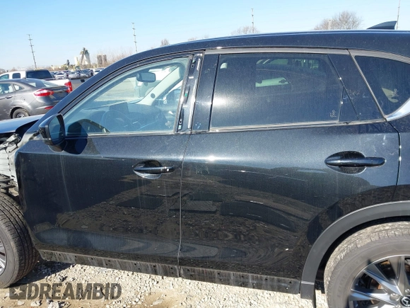 2021 Mazda CX-5 Grand Touring with VIN JM3KFBDM0M0468081, listed as a IAAI auction lot 41894411 with 54,664 mi miles. Bid and sale history available at carsss.com. Image 15.