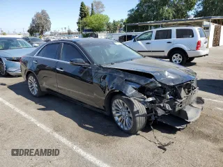 2015 Cadillac CTS Luxury AWD z VIN 1G6AX5SX3F0114674, wystawiony jako Copart lot #53913865 z przebiegiem 103 959 mil mil oraz Szkoda całkowita • Salvage title. Historia ofert i sprzedaży dostępna na DreamBid. Obrazek 4.