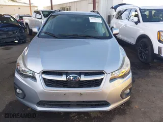 2013 Subaru Impreza Wagon 2.0i Sport Premium with VIN JF1GPAL61DH204707, listed as a IAAI auction lot 40641252 with 142,653 mi miles. Bid and sale history available at carsss.com. Image 12.