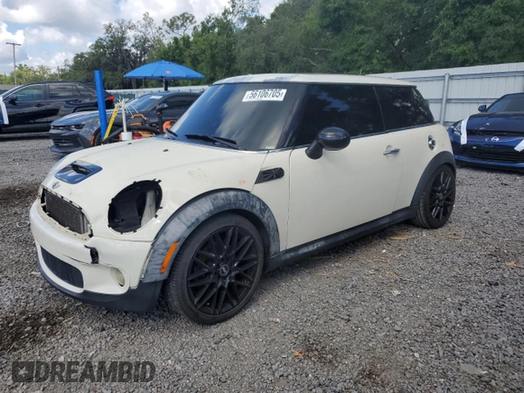 2010 MINI Hardtop S with VIN WMWMF7C5XATW89025, listed as a Copart auction lot 56106705 with 141,216 mi miles and Salvage title. Bid and sale history available at DreamBid. Image 1.