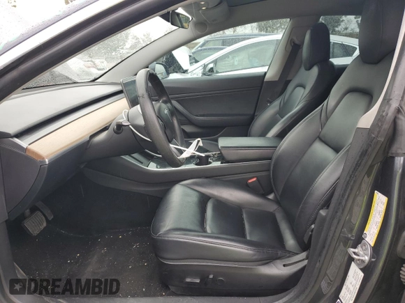 2019 Tesla Model 3 Mid Range with VIN 5YJ3E1EA9KF447453, listed as a Copart auction lot 48967605 with 72,031 mi miles and Salvage Title. Bid and sale history available at DreamBid. Image 7.