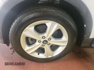 2014 Ford Escape SE z VIN 1FMCU9GX7EUC02600, wystawiony jako IAAI lot #42570755 z przebiegiem 86 871 mil mil oraz . Historia ofert i sprzedaży dostępna na DreamBid. Obrazek 34.