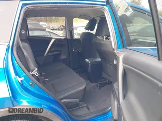 2018 Toyota RAV4 LE with VIN JTMBFREV8JJ220630, listed as a IAAI auction lot 42001795 with 86,027 mi miles. Bid and sale history available at carsss.com. Image 8.