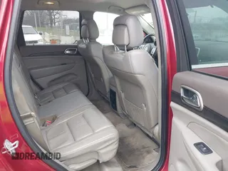 2013 Jeep Grand Cherokee Laredo with VIN 1C4RJEAG4DC573971, listed as a IAAI auction lot 41627288 with 143,256 mi miles. Bid and sale history available at carsss.com. Image 8.