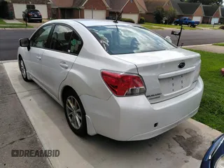 2014 Subaru Impreza Premium with VIN JF1GJAC68EH007312, listed as a IAAI auction lot 42717142 with 111,951 mi miles and . Bid and sale history available at DreamBid. Image 3.