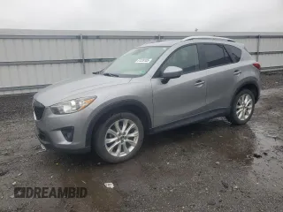 2014 Mazda CX-5 Grand Touring with VIN JM3KE4DY4E0382761, listed as a Copart auction lot 51235105 with 80,798 mi miles and Salvage Title. Bid and sale history available at carsss.com. Image 1.