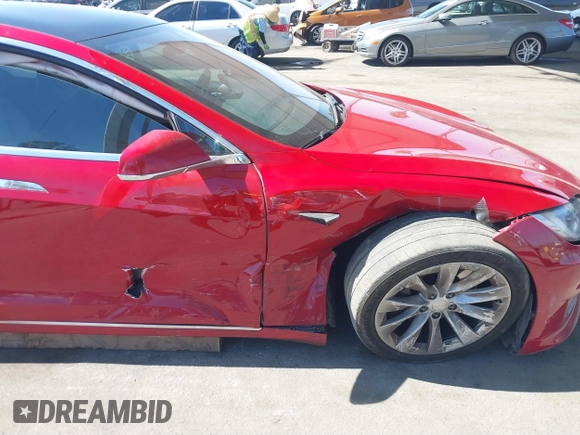2016 Tesla Model S 90D with VIN 5YJSA1E22GF174654, listed as a IAAI auction lot 41700676 with 193,813 mi miles and . Bid and sale history available at DreamBid. Image 6.