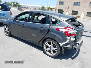 2015 Ford Focus Titanium with VIN 1FADP3N27FL380525, listed as a IAAI auction lot 42493542 with 86,423 mi miles and . Bid and sale history available at DreamBid. Image 3.