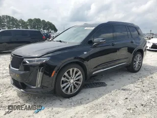 2020 Cadillac XT6 AWD Sport with VIN 1GYKPHRS9LZ100390, listed as a Copart auction lot 59498935 with 54,624 mi miles and Salvage title. Bid and sale history available at DreamBid. Image 1.