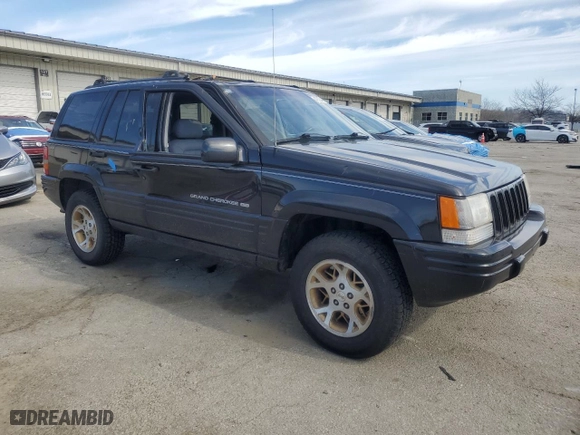 1998 Jeep Grand Cherokee Limited with VIN 1J4GZ78Y0WC140588, listed as a Copart auction lot 49522445 with 62,195 mi miles and Salvage Title. Bid and sale history available at carsss.com. Image 4.