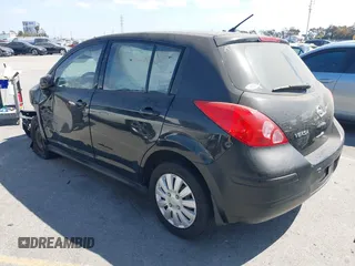 2012 Nissan Versa S with VIN 3N1BC1CPXCK250702, listed as a IAAI auction lot 41899436 with 136,378 mi miles. Bid and sale history available at carsss.com. Image 3.