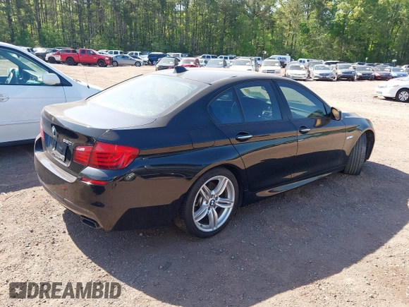 2013 BMW 5 Series 550i with VIN WBAFR9C50DDX81156, listed as a IAAI auction lot 42015608 with 99,962 mi miles and . Bid and sale history available at carsss.com. Image 4.