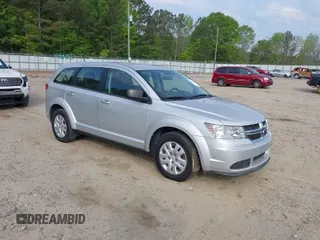 2014 Dodge Journey SE with VIN 3C4PDCAB0ET139916, listed as a IAAI auction lot 42072199 with 92,591 mi miles and . Bid and sale history available at carsss.com. Image 1.