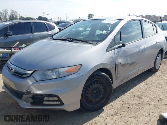 2012 Honda Insight LX с VIN JHMZE2H56CS001570, выставлен на аукционе IAAI как лот 41461236 с пробегом 129 431 миль миль и . История ставок и продаж доступна на DreamBid. Изображение 2.
