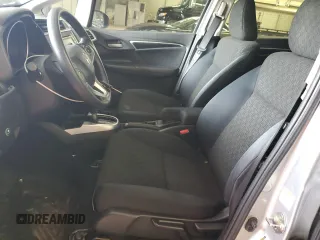 2016 Honda Fit LX with VIN JHMGK5H50GX005947, listed as a Copart auction lot 57699275 with 103,698 mi miles and Salvage title. Bid and sale history available at DreamBid. Image 7.