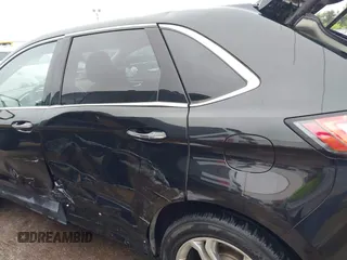 2015 Ford Edge Titanium z VIN 2FMTK4K96FBB24674, wystawiony jako IAAI lot #42403892 z przebiegiem 113 816 mil mil oraz . Historia ofert i sprzedaży dostępna na DreamBid. Obrazek 6.