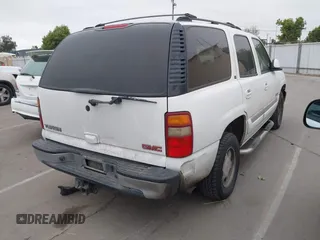 2002 GMC Yukon SLT with VIN 1GKEC13T02R313772, listed as a IAAI auction lot 42131289 with 215,164 mi miles. Bid and sale history available at carsss.com. Image 4.