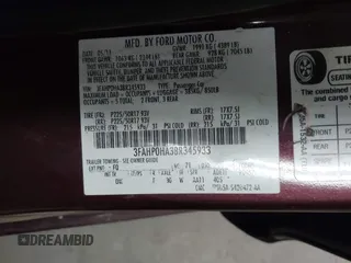 2011 Ford Fusion SE with VIN 3FAHP0HA3BR345933, listed as a IAAI auction lot 42008980 with 147,076 mi miles. Bid and sale history available at carsss.com. Image 9.