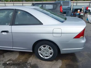 2001 Honda Civic LX with VIN 1HGEM22511L104898, listed as a IAAI auction lot 41855518 with 255,538 mi miles. Bid and sale history available at carsss.com. Image 21.