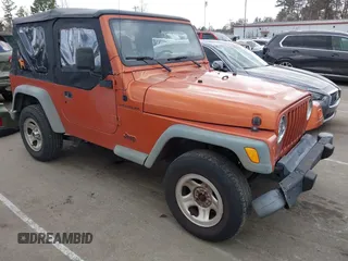 2000 Jeep Wrangler SE with VIN 1J4FA29P2YP804574, listed as a IAAI auction lot 41723297 with 172,991 mi miles. Bid and sale history available at carsss.com. Image 1.