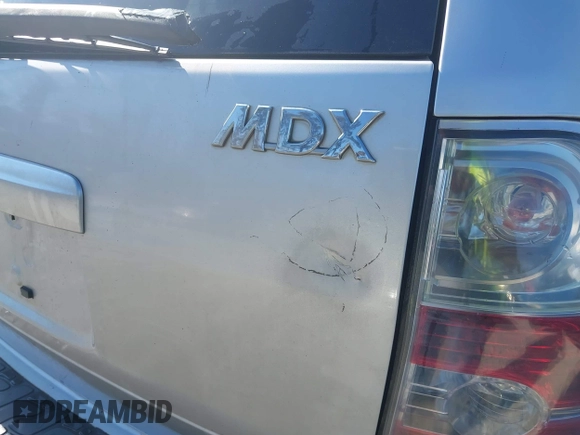 2005 Acura MDX Touring with VIN 2HNYD18925H532699, listed as a IAAI auction lot 41648795 with 318,775 mi miles. Bid and sale history available at carsss.com. Image 14.