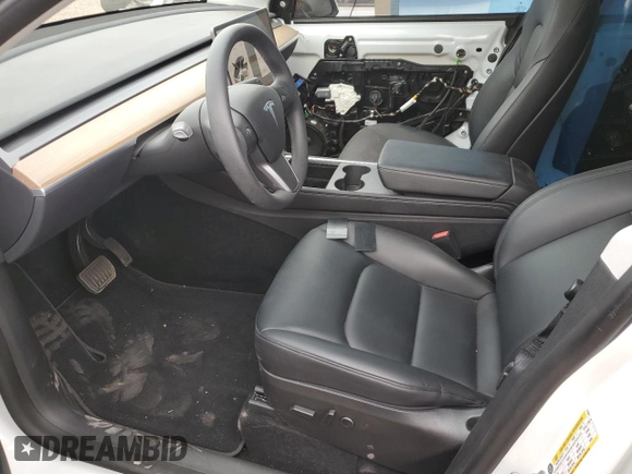 2022 Tesla Model Y Long Range z VIN 7SAYGDEE5NA015841, wystawiony jako Copart lot #57842275 z przebiegiem 51 952 mil mil oraz Szkody całkowita. Historia ofert i sprzedaży dostępna na DreamBid. Obrazek 7.