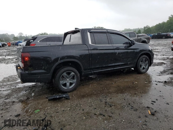 2023 Honda Ridgeline RTL with VIN 5FPYK3F51PB067811, listed as a Copart auction lot 56795995 with 21,500 mi miles and Salvage title. Bid and sale history available at DreamBid. Image 3.