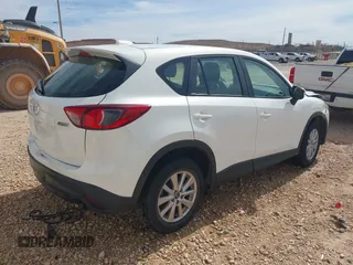 2016 Mazda CX-5 Sport with VIN JM3KE2BYXG0683318, listed as a IAAI auction lot 41777751 with 116,922 mi miles. Bid and sale history available at carsss.com. Image 4.