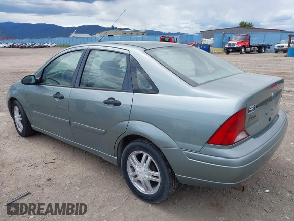 2003 Ford Focus SE z VIN 1FAFP34PX3W135265, wystawiony jako IAAI lot #42354012 z przebiegiem 79 617 mil mil oraz . Historia ofert i sprzedaży dostępna na DreamBid. Obrazek 3.