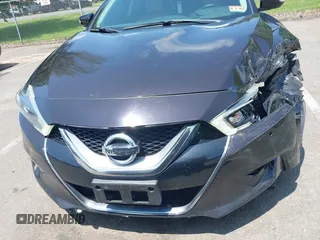 2016 Nissan Maxima SL with VIN 1N4AA6AP5GC393122, listed as a IAAI auction lot 42523884 with 116,659 mi miles and . Bid and sale history available at DreamBid. Image 6.