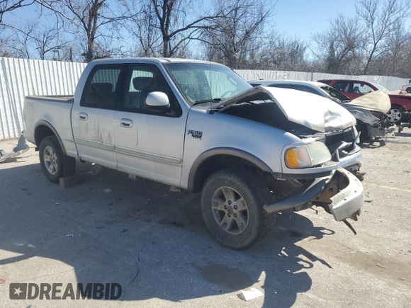 2003 Ford F-150 XLT with VIN 1FTRW08L03KD74119, listed as a Copart auction lot 47373105 with 303,513 mi miles and Salvage Title. Bid and sale history available at carsss.com. Image 4.