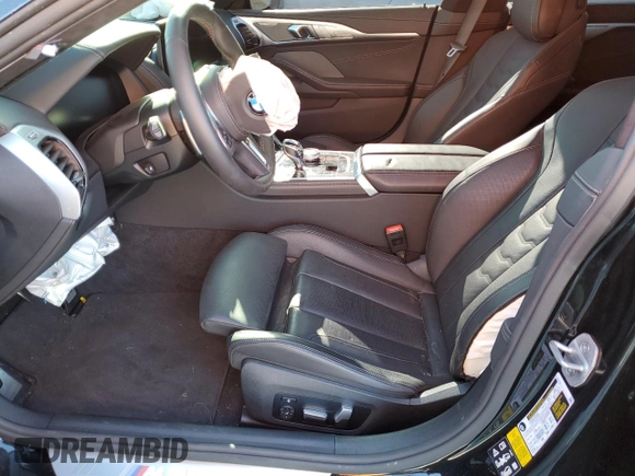 2023 BMW 8 Series M850i with VIN WBAGV8C06PCL57473, listed as a Copart auction lot 39398193 with Not provided miles and . Bid and sale history available at DreamBid. Image 7.