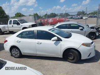 2015 Toyota Corolla L z VIN 5YFBURHE3FP271683, wystawiony jako IAAI lot #37424533 z przebiegiem 153 438 mil mil oraz . Historia ofert i sprzedaży dostępna na DreamBid. Obrazek 13.