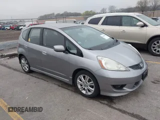 2009 Honda Fit Sport with VIN JHMGE88469S063030, listed as a IAAI auction lot 42064670 with 156,791 mi miles. Bid and sale history available at carsss.com. Image 1.