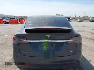 2017 Tesla Model X 90D with VIN 5YJXCBE22HF079194, listed as a IAAI auction lot 41895591 with 102,437 mi miles and . Bid and sale history available at DreamBid. Image 16.