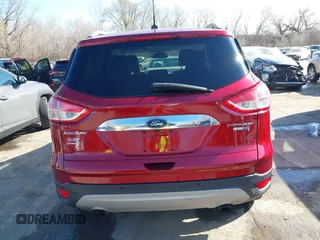 2014 Ford Escape Titanium with VIN 1FMCU9J97EUB79748, listed as a IAAI auction lot 41884915 with 197,899 mi miles. Bid and sale history available at carsss.com. Image 16.
