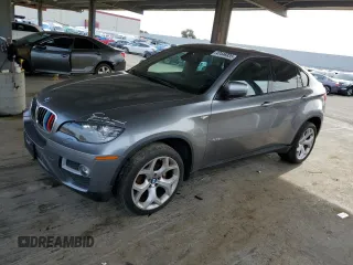 2013 BMW X6 xDrive35i z VIN 5UXFG2C59DL787607, wystawiony jako Copart lot #47446935 z przebiegiem 115 867 mil mil oraz Czysty tytuł • Clean title. Historia ofert i sprzedaży dostępna na DreamBid. Obrazek 1.