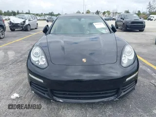 2015 Porsche Panamera S E-Hybrid z VIN WP0AD2A72FL040703, wystawiony jako IAAI lot #41937431 z przebiegiem 77 933 mil mil oraz . Historia ofert i sprzedaży dostępna na DreamBid. Obrazek 17.