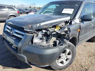 2008 Honda Pilot EX-L with VIN 5FNYF28518B006058, listed as a IAAI auction lot 41425424 with 230,006 mi miles. Bid and sale history available at carsss.com. Image 6.