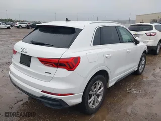 2023 Audi Q3 S line Premium with VIN WA1DECF35P1127797, listed as a IAAI auction lot 41353532 with 34,581 mi miles. Bid and sale history available at carsss.com. Image 4.