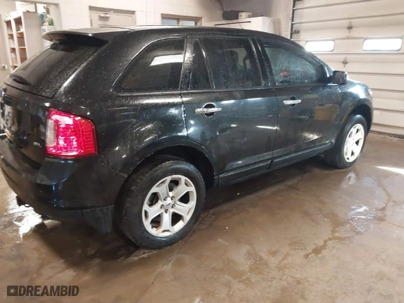 2011 Ford Edge SEL with VIN 2FMDK3JC1BBB02197, listed as a IAAI auction lot 41385637 with 253,602 mi miles. Bid and sale history available at carsss.com. Image 4.
