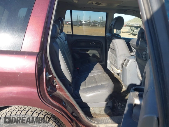 2007 Honda Pilot EX-L with VIN 2HKYF18677H524713, listed as a IAAI auction lot 41345312 with 169,957 mi miles and . Bid and sale history available at DreamBid. Image 8.