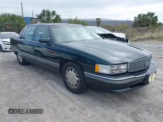 1996 Cadillac DeVille z VIN 1G6KF5298TU269234, wystawiony jako IAAI lot #41345945 z przebiegiem 34 218 mil mil oraz . Historia ofert i sprzedaży dostępna na DreamBid. Obrazek 1.