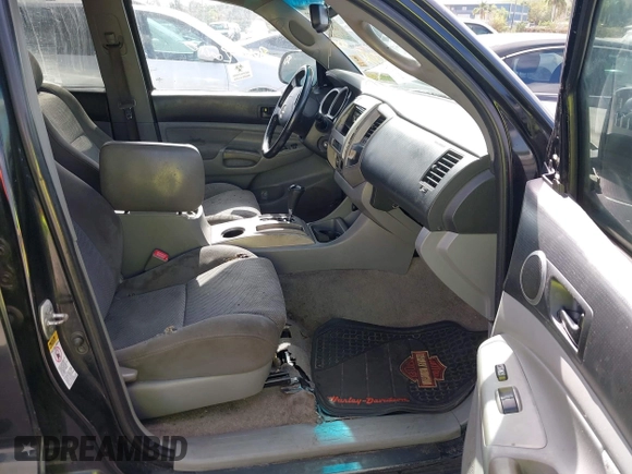 2010 Toyota Tacoma PreRunner with VIN 3TMJU4GN6AM099990, listed as a IAAI auction lot 41530022 with 193,139 mi miles and . Bid and sale history available at DreamBid. Image 5.