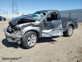 2014 Ford F-150 XL with VIN 1FTMF1CT1EFB47492, listed as a Copart auction lot 49400635 with 188,533 mi miles and Salvage Title. Bid and sale history available at carsss.com. Image 1.