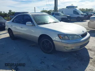 1997 Lexus ES 300 Luxury Sport Sdn with VIN JT8BF22G7V0076821, listed as a IAAI auction lot 41671698 with 1 mi miles. Bid and sale history available at carsss.com. Image 1.