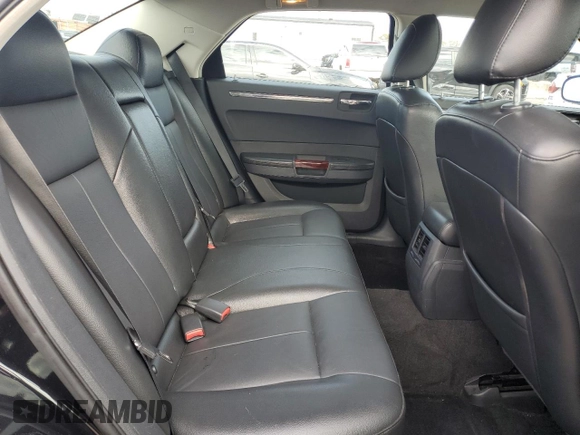 2009 Chrysler 300 with VIN 2C3LK33V19H614083, listed as a Copart auction lot 77529014 with 188,125 mi miles and Salvage title. Bid and sale history available at DreamBid. Image 10.