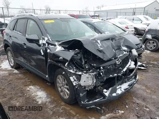 2014 Mazda CX-5 Touring with VIN JM3KE2CY2E0407453, listed as a IAAI auction lot 41564916 with 104,852 mi miles. Bid and sale history available at carsss.com. Image 1.