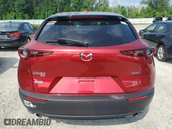2020 Mazda CX-30 Preferred с VIN 3MVDMBDL3LM112989, выставлен на аукционе Copart как лот 63645075 с пробегом 63 592 миль миль и Списание • Salvage title. История ставок и продаж доступна на DreamBid. Изображение 6.